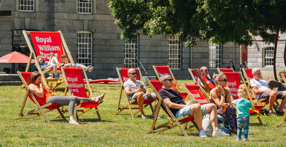 People on the green at Royal William Yard